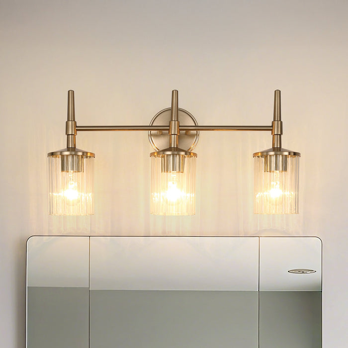Vanity Light Thesis 207694A Andrea 24 inch 3 light Champagne Gold Vanity Light with Clear Ribbed Glass Shades THESIS