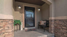 Wall Lantern Nuvo 60-5602 Drexel - 1 Light - 9 in. - Outdoor Wall Fixture with Frosted Seed Glass - Stone Black Finish Nuvo