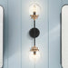 Sconce Nuvo 60-7122 Axis - 2 Light - Wall Sconce Fixture - Matte Black Finish with Brass Accents - Clear Glass Nuvo