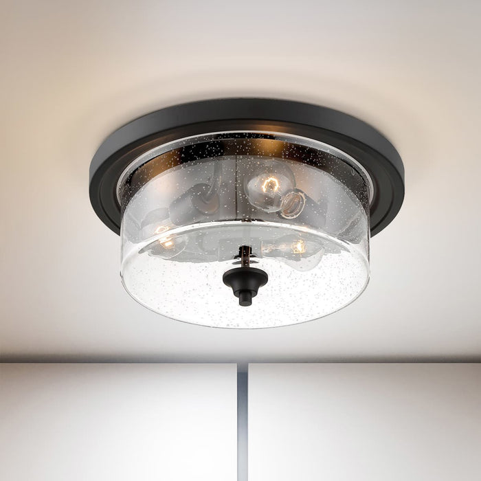 Flush Mount Nuvo 60-7291 Bransel - 3 Light - Flush Mount Fixture - Matte Black Finish with Clear Seeded Glass Nuvo