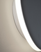 Close-up of a modern ceiling light fixture with a neutral background