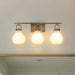 Vanity Light Thesis 207856A Mansfield 24 inch 3 light Champagne Gold Vanity Light with Opal Glass Shades THESIS
