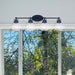 Bath Vanity Canarm IVL705A04BK Carson Black Four Light Vanity w/ Seeded Glass Canarm